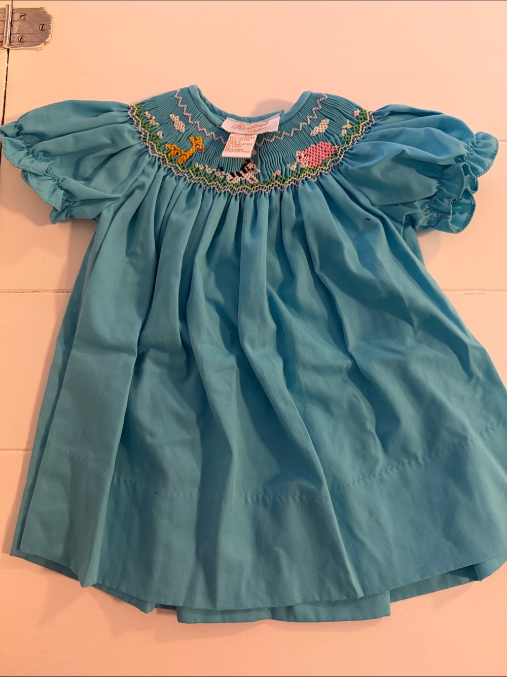 Hand-Smocked Turquoise Puff-Sleeve Girls' Dress with Giraffe, zebra and pig!